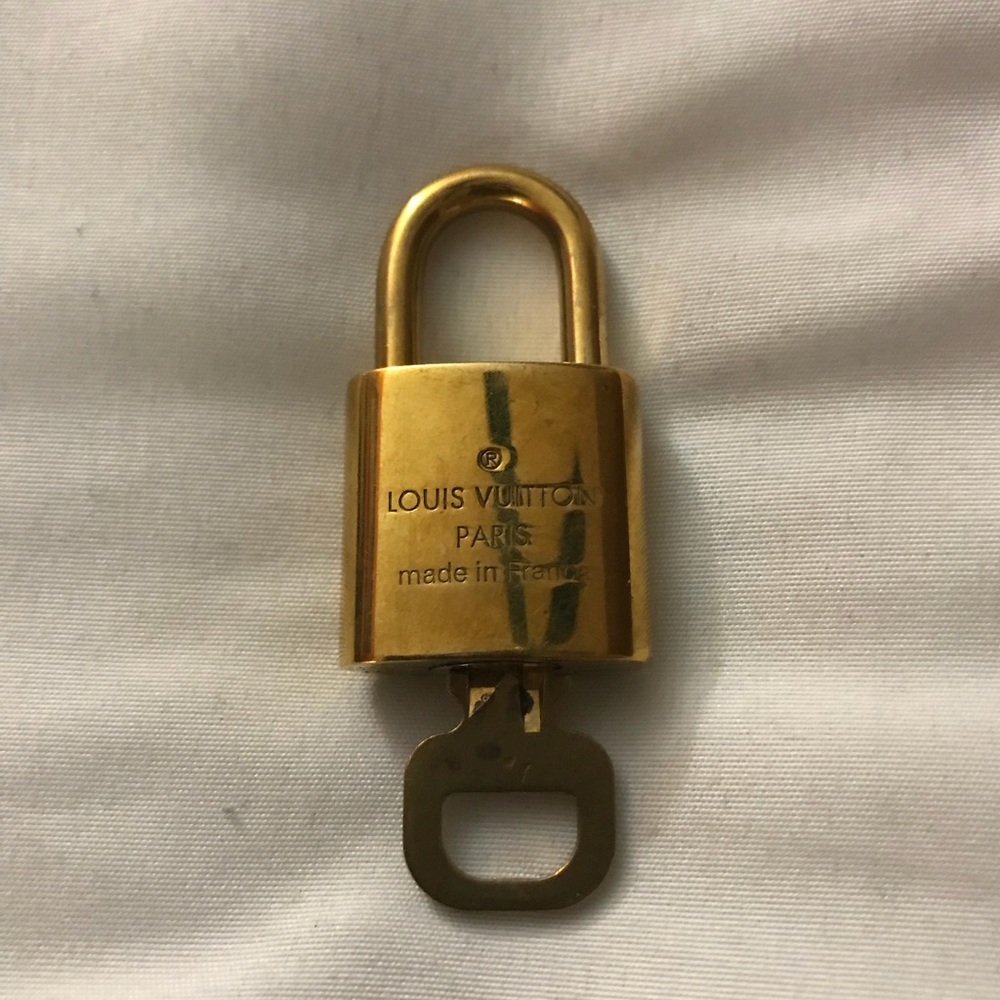Authentic Louis Vuitton lock with key